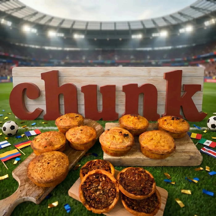 Pie selection to celebrate the World Cup 2026. Three different pie flavours placed on wooden boards with an football themed background.