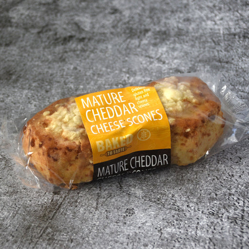 Two gluten free cheese scones in a plastic package