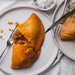gluten free chicken and chorizo pasty served on a white plate.